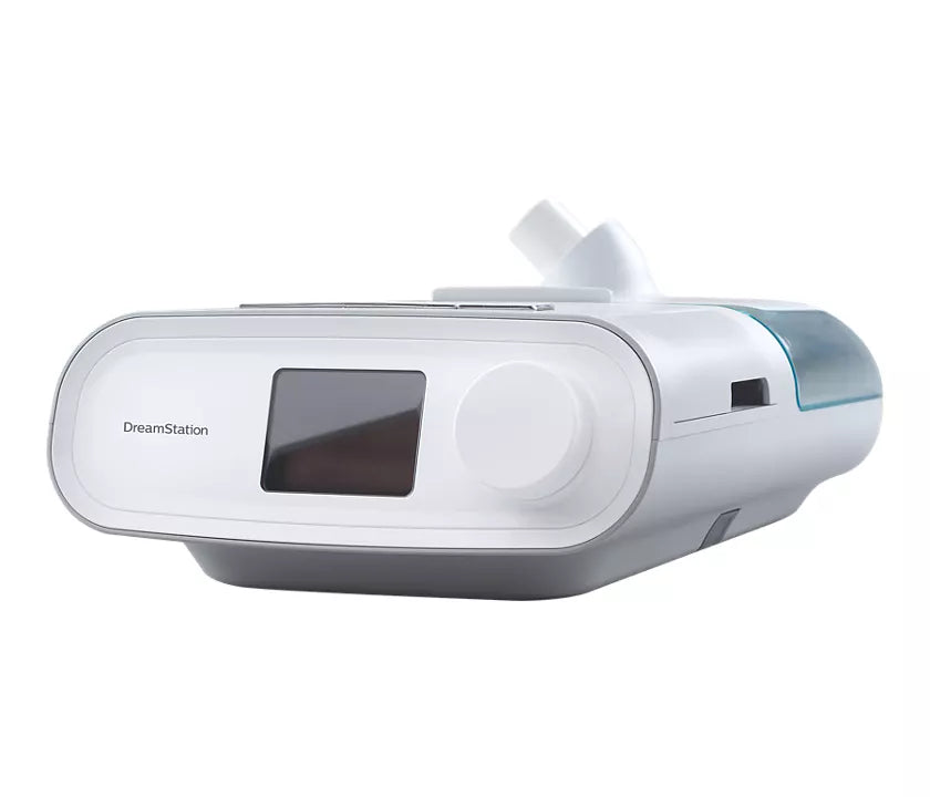 Side view of Philips Respironics Dreamstation Auto CPAP with humidifier attached